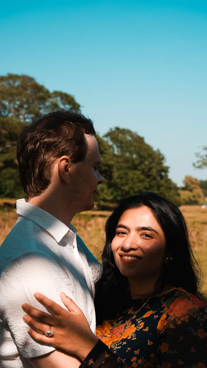 Surprise proposal photographer London golden hour couple portrait after the proposal